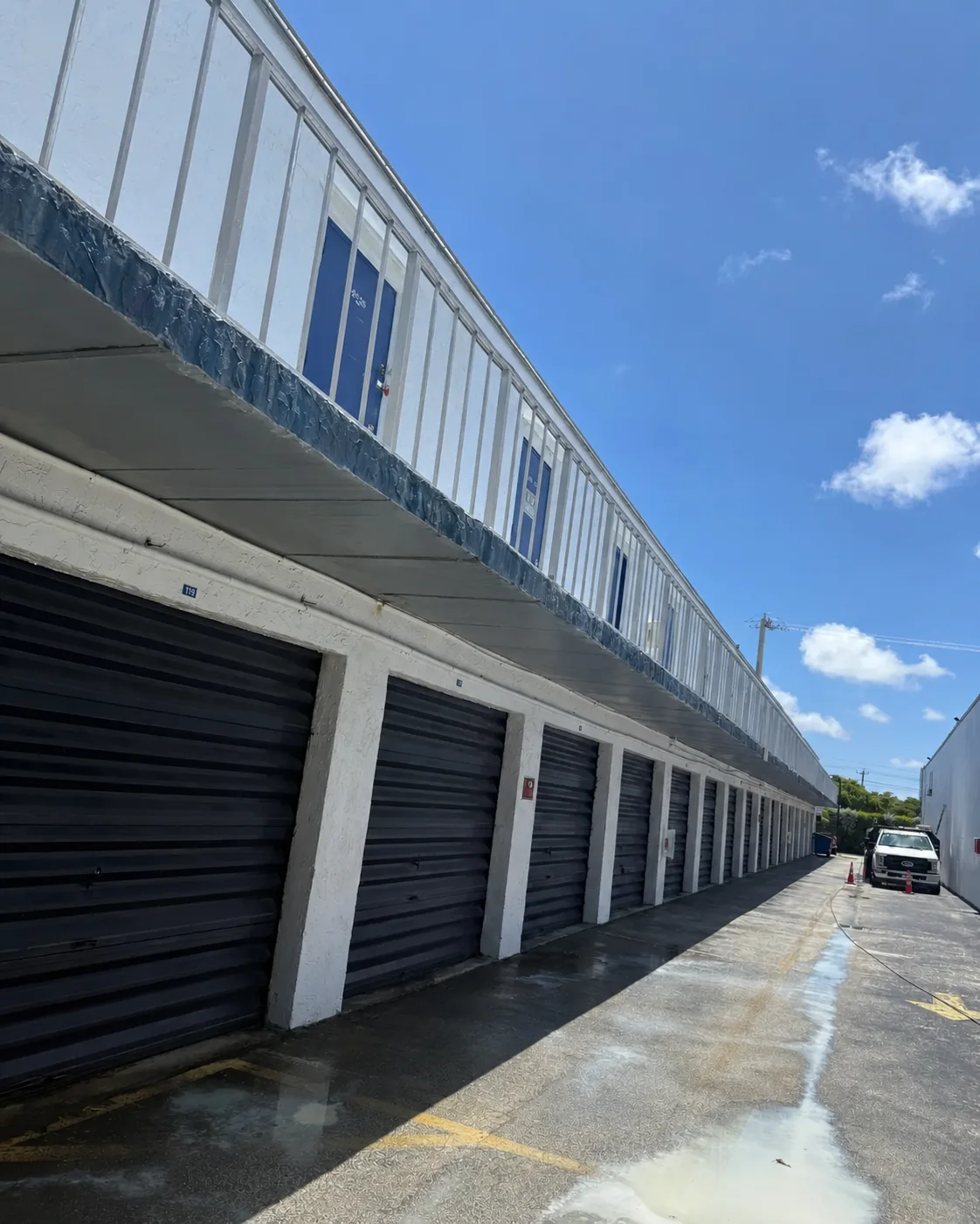 The same commercial concrete walkway after professional cleaning