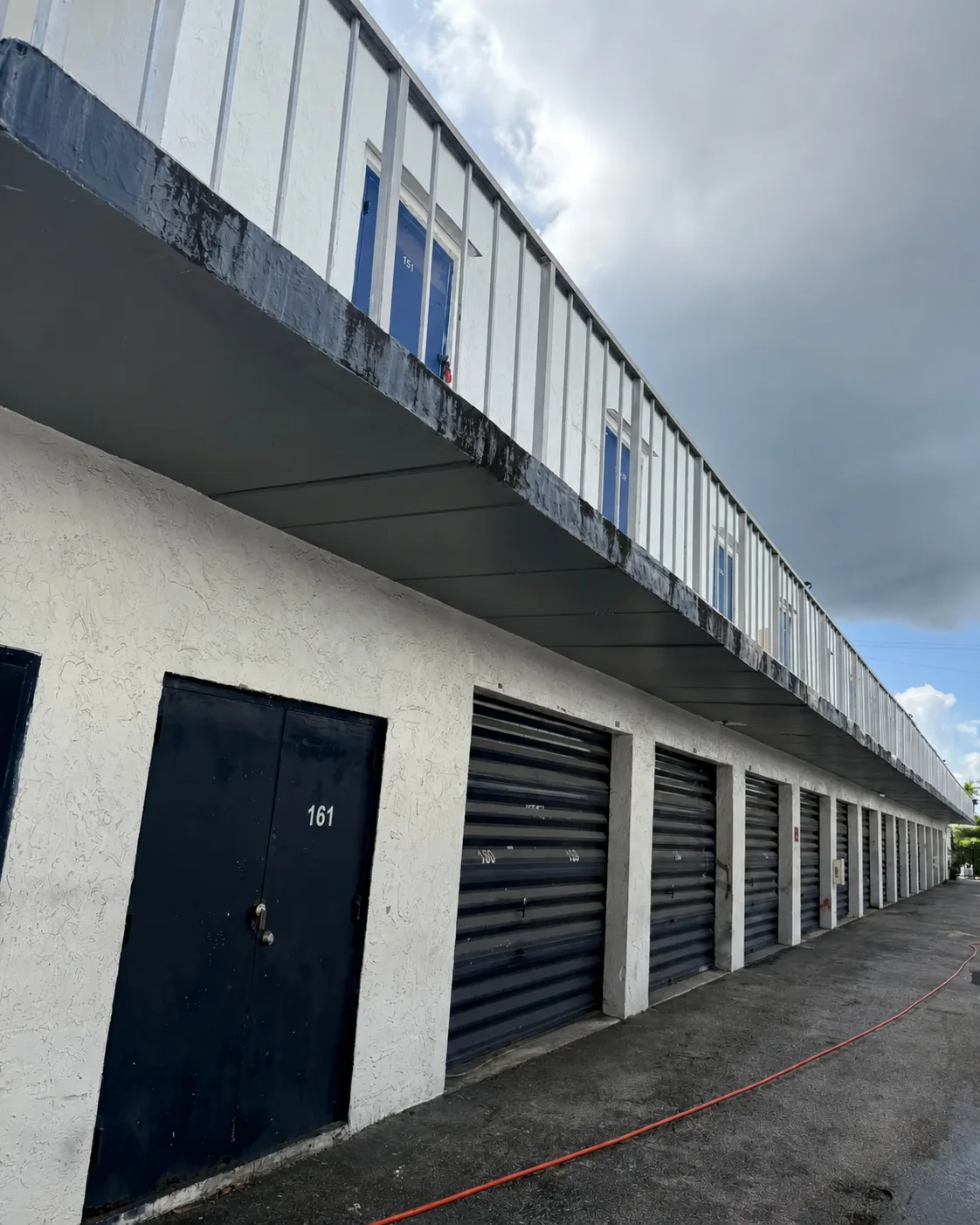 Commercial concrete walkway before professional cleaning